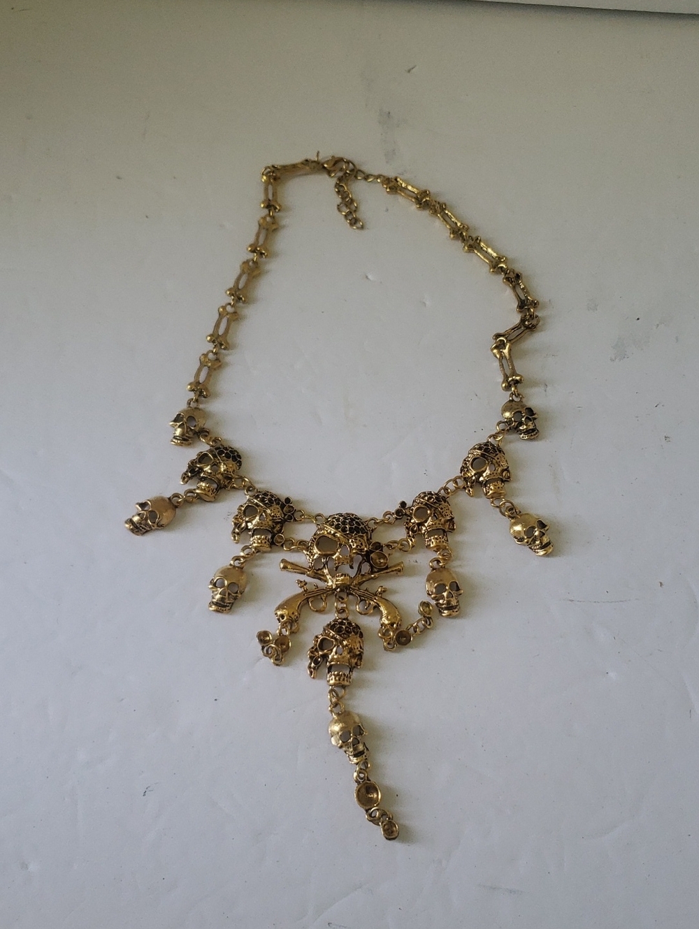 Pirates Of The Carribean Skull Gold Toned Necklace